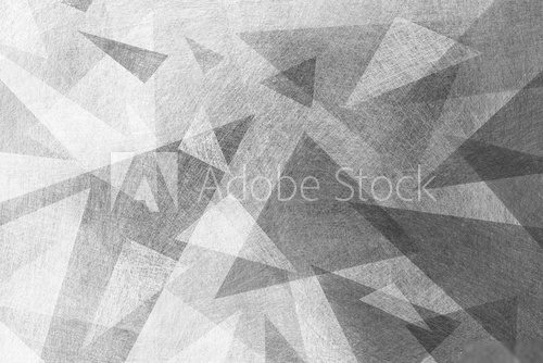 black and white background with abstract geometric design of gray layers of triangle and polygon shapes with texture