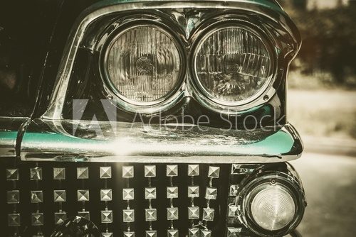 Close-up of retro car facia with chrome grille