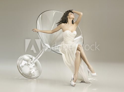 Conceptual photo of woman in the glass