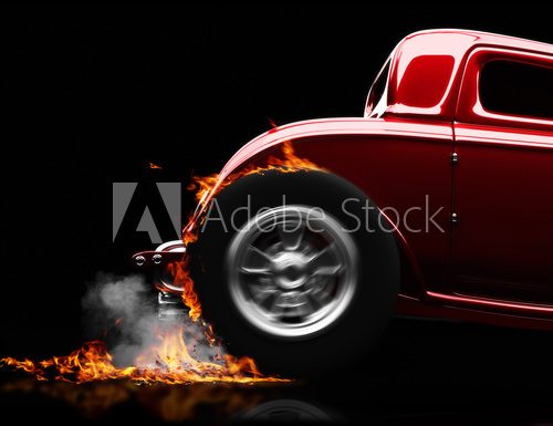 Hot rod burnout on a black background