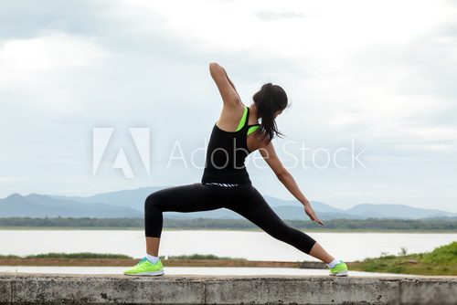 lady exercise and stretching in natural view