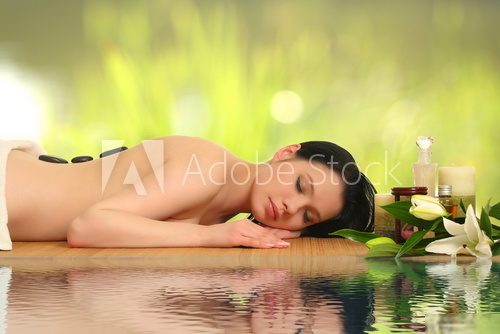 beautiful woman relaxing in spa