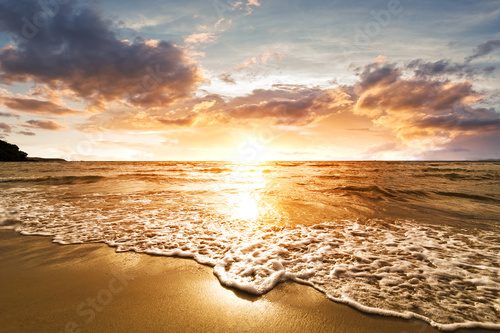 The beach with sunset and cloud in golden hours.