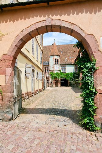 yard in medieval Riquewihr town, France